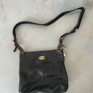 Fossil black leather cross body bag with brown accents and brass hardware